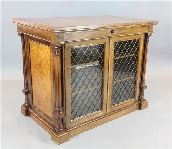 A fine quality early Victorian walnut and birds eye maple library cabinet, W.4ft D.2ft 6in. H.3ft 2in.
